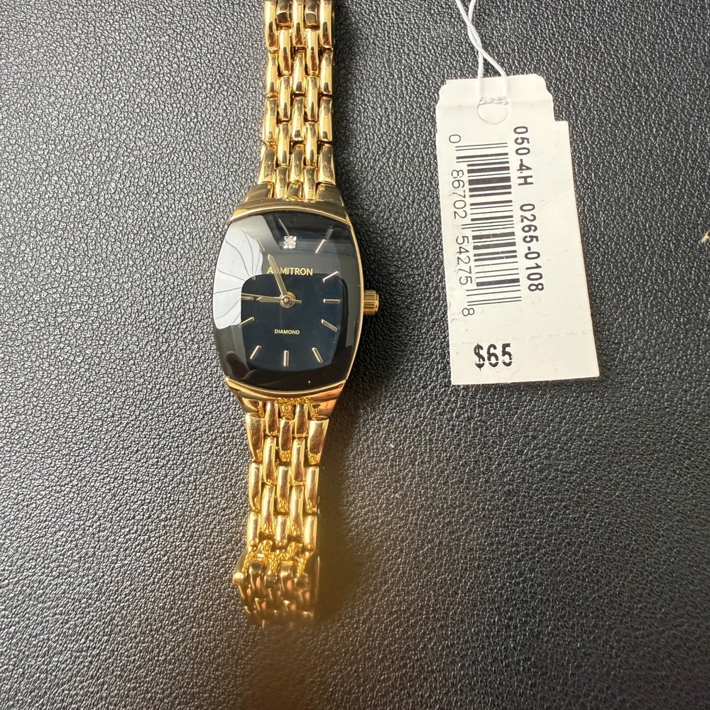 MSRP $65 Armitron 75/5195GP Women's Gold Tone Bracelet Watch New Battery Di